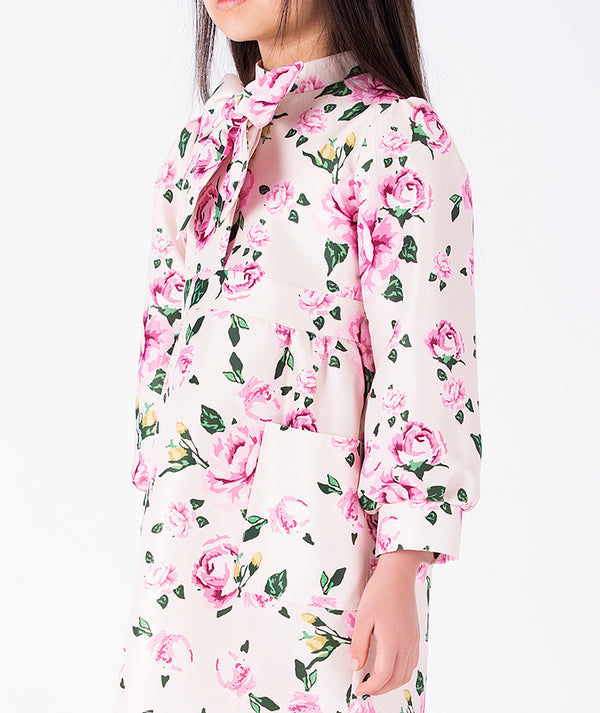 Hanae floral girls dress with pink flowers statement neckline bow and front patch pocket by Mama Luma