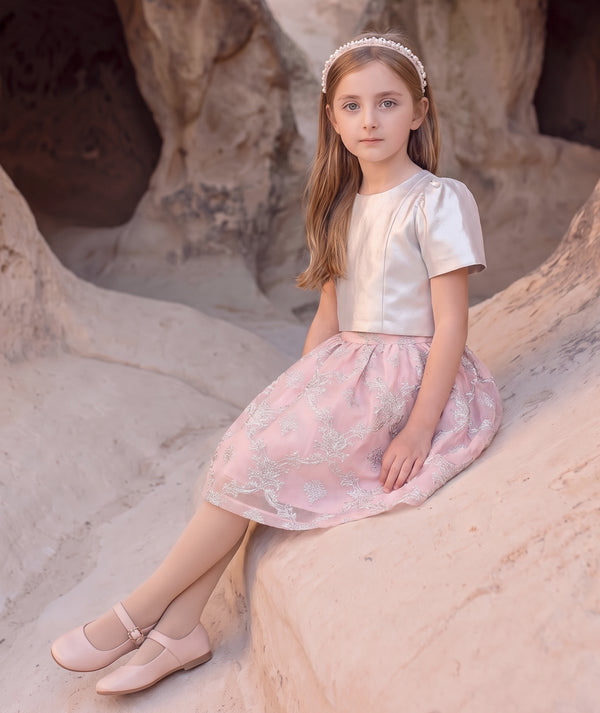 Editorial view of the Hanae silver and blush pink jacquard bow girls’ outfit for ages 3 to 12