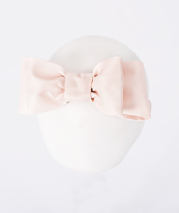 Ivory girls bow headband from Mama Luma’s Altai Morin Collection, an elegant hair accessory for weddings, birthdays and special occasions.