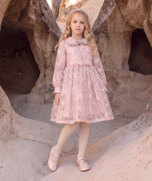 Front view of Jacquard Bow Girls Dress in blush pink jacquard for girls ages 3 to 12, a premium children’s design by Mama Luma
