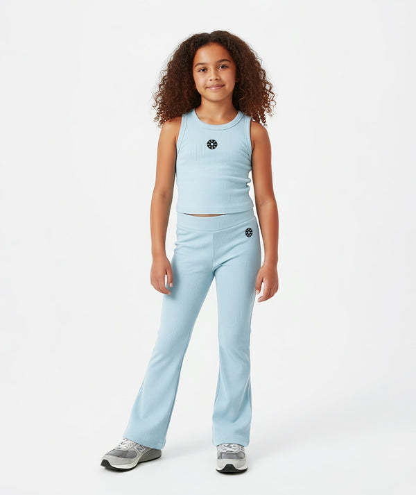 Girl wearing a light blue sleeveless tank top and matching ribbed pants, styled for everyday athleisure, movement, and casual activewear, available in sizes 3–14