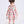 Load image into Gallery viewer, Back view of the Mahe Lotus Floral Baby Dress showing the softly flared silhouette and back zip closure, made from breathable lightweight fabric, designed for babies ages 12–36 months for family gatherings, holidays, and warm-weather outings.
