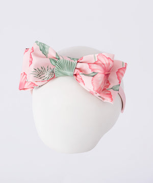 Floral Bow Headband featuring a structured bow in the signature floral print, crafted from premium lightweight fabric, designed as an elegant hair accessory for birthdays, weddings, and special occasions.