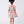 Load image into Gallery viewer, Back view of the Mahe Lotus Floral Girls Dress showing the refined collar detail, tailored bodice, and softly flared skirt crafted from breathable lightweight fabric, designed for girls ages 3–12 for Eid celebrations, garden parties, and spring–summer occasions.
