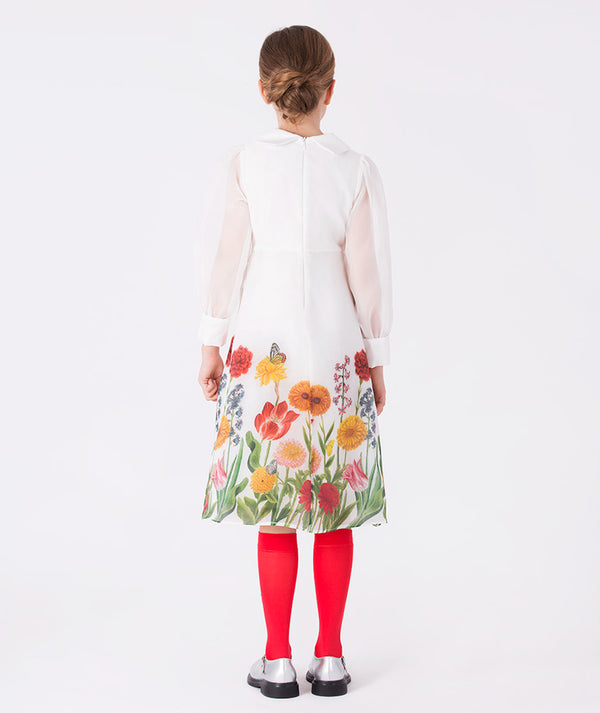 Back view of Mama Luma’s Asagao Flowers Dress from the festive Christmas collection, with a colorful floral print and cuffed sleeves — ideal for holiday parties, pageants, and winter family photos. Available in girls’ sizes 3–12Y.