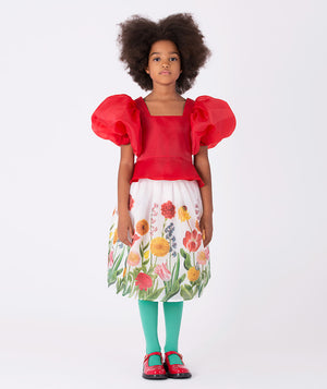 Girl wearing Mama Luma’s Asagao Flowers Outfit with a red organza top and floral skirt — perfect for Christmas, winter weddings, and holiday portraits. Available in girls’ sizes 3–12 Y.