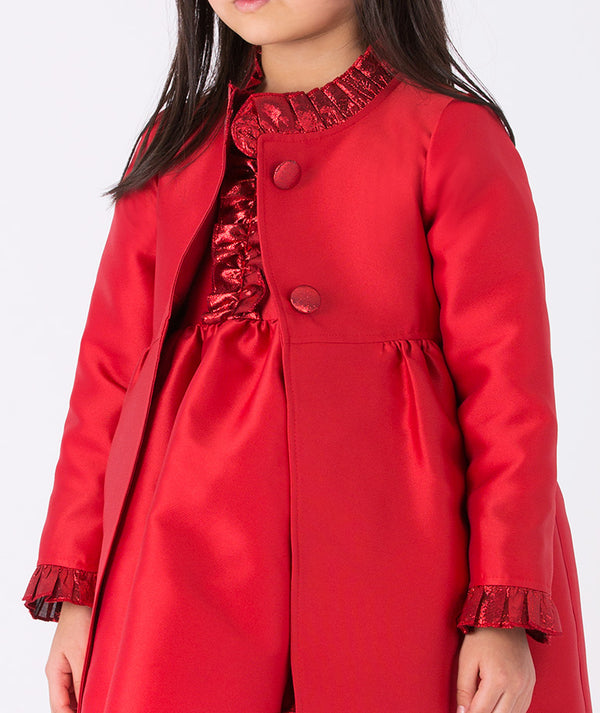 Girl wearing Mama Luma’s Exquisite Ruffles Caftan in red metallic satin over a matching festive dress — perfect for Christmas parties, pageants, and winter gatherings. Available in girls’ sizes 3–12 Y.