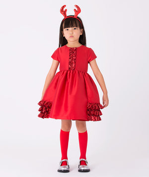 Girl wearing Mama Luma’s Exquisite Ruffles Dress in metallic red with layered ruffles — perfect for Christmas parties, holiday portraits, and winter celebrations. Available in girls’ sizes 3–12 Y.