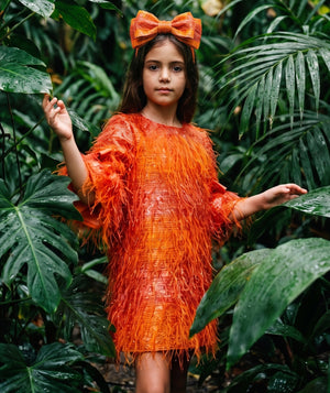 Mama Luma girls party dress editorial featuring elegant luxury special occasionwear for celebrations.