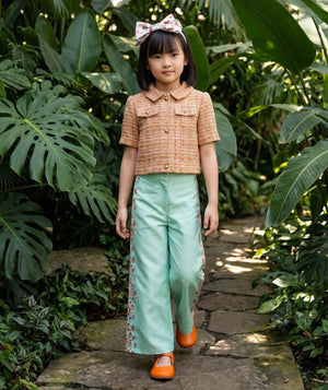 Mama Luma girls special occasion fashion editorial featuring premium dresses and luxury children’s styling.