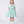 Charger l'image dans la galerie, Front view of the Swan Pearl Mint Girls Dress by Mama Luma, featuring a flared silhouette, Peter Pan collar, and premium lightweight fabric, fully cotton lined for comfort, designed for girls ages 3–12 for birthdays, Easter, and special occasions.
