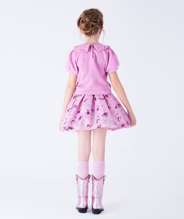 Back view of lilac Orchid Petal girls floral satin skirt with orchid print, elegant knee-length skirt outfit for girls