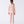 Carica l'immagine nel visualizzatore Galleria, Girl seen from the back wearing a Mama Luma two-piece pink floral bikini with ruffle details and matching floral swim shoes. A charming summer look perfect for the beach, pool, and vacation days. Available in girls’ sizes 3–12 years.
