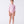 Carica l'immagine nel visualizzatore Galleria, Girl wearing a Mama Luma pink polka-dot long-sleeve rash guard swimsuit with ruffle waist detail and matching swim shoes. A playful and elegant design for summer adventures, pool days, and beach vacations. Available in girls’ sizes 3–12 years.
