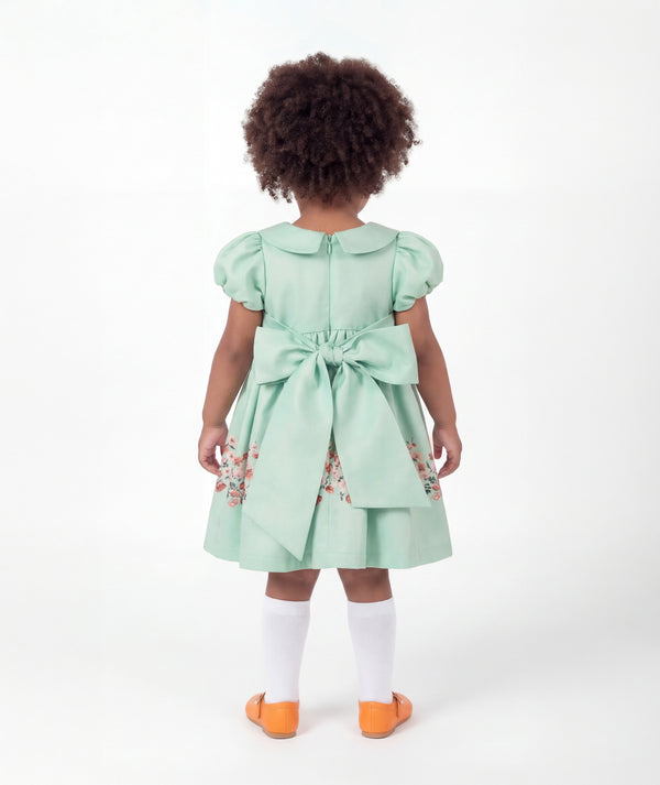 Back view of Marambaia Baby Dress in mint green for babies ages 1 to 3, showing the silhouette and refined construction