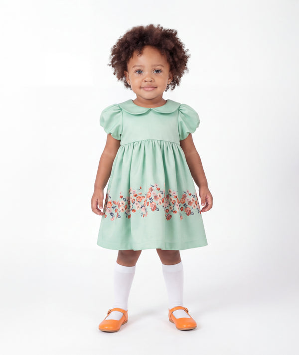 Front view of Marambaia Baby Dress in mint green for babies ages 1 to 3, a premium children’s design by Mama Luma