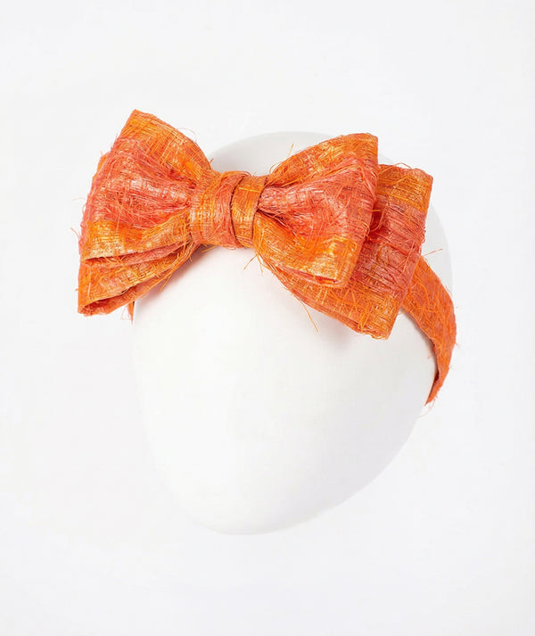 Front view of Matching Feathers Headband in orange feather, a premium children’s design by Mama Luma
