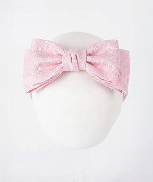 Front view of Matching Jacquard Headband in blush pink jacquard, styled as premium children’s special occasionwear