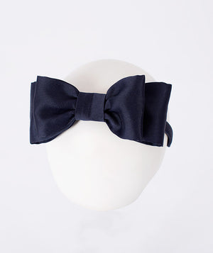 Front view of Matching Navy Headband in navy satin, a premium children’s design by Mama Luma