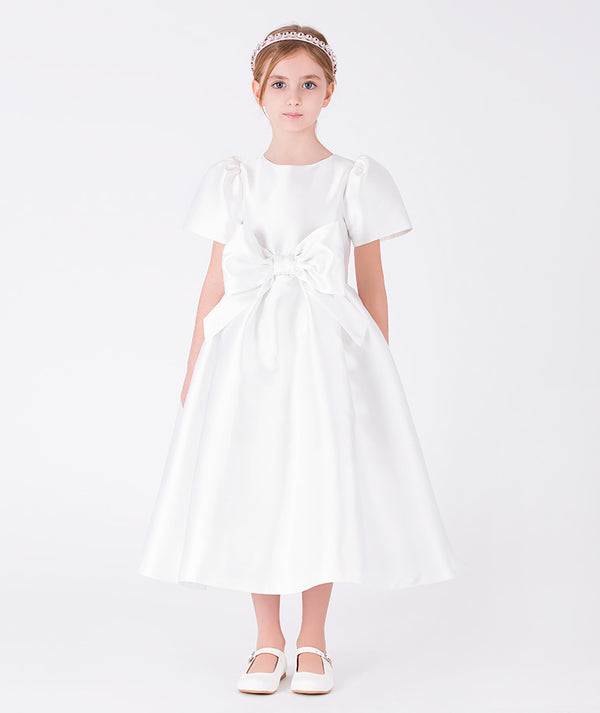 Front view of Mikado Satin Girls Bow Dress in ivory mikado satin for girls ages 3 to 12, a premium children’s design by Mama Luma