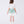 Load image into Gallery viewer, Back view of a mint green floral girls outfit featuring a short sleeve top with puff sleeves and a matching skirt with contrast hem, styled for birthdays, weddings, garden parties, and special occasions, available in sizes 3–12
