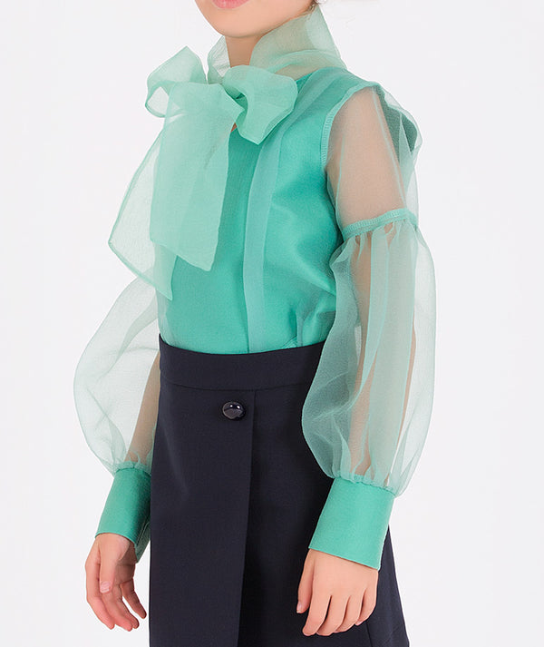 mint bow blouse and navy skirt