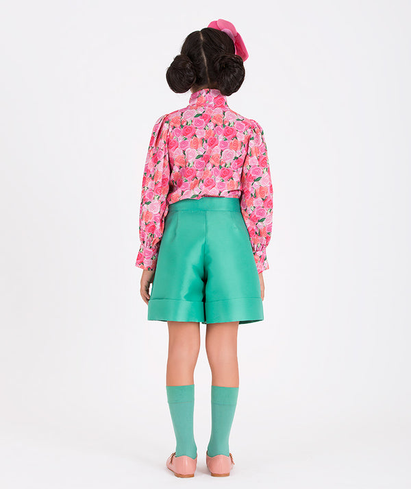 mint shorts and flower-printed blouse 