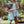 Load image into Gallery viewer, Mother and daughter walking in matching mint floral dresses
