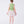 Load image into Gallery viewer, Back view of a two-piece girls outfit with a structured top and flared floral skirt, finished with a clean and elegant silhouette.
