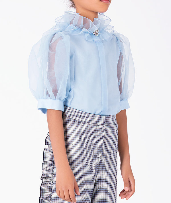 Powder blue girls blouse featuring sheer organza puff sleeves, high ruffled neckline and sparkling jewel accent