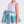 Load image into Gallery viewer, Detail view of Pastel Stripes Girls Dress with oversized striped bow and pastel color accents by Mama Luma
