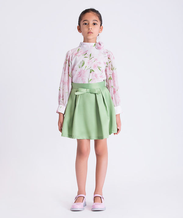 Front view of the Peonia Petals girls outfit featuring a floral blouse and structured skirt, styled for Easter events and elegant daytime occasions for ages 3–12.