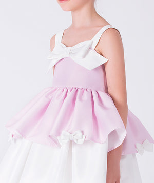 Close-up of the bow and layered bodice on a pink girls party dress, ideal for weddings, birthdays, and special occasions for ages 3–12.