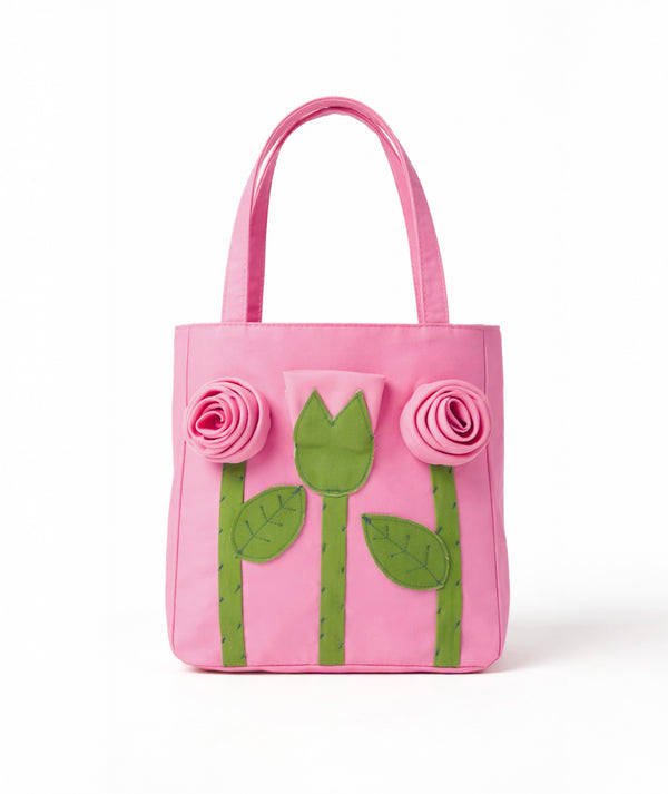 Pink felt girls handbag with green tulip appliqués