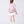 Load image into Gallery viewer, Back view of a pink floral girls occasion outfit featuring a short sleeve structured top and a matching flared skirt with contrast hem, styled for birthdays, weddings, garden parties, and special occasions, available in sizes 3–12
