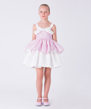 Front view of a pink layered girls dress with bow detail, designed for flower girl moments, parties, and elegant celebrations for ages 3–12.