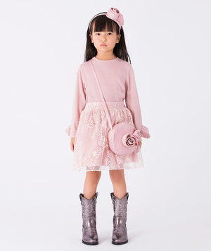 Front view of the Pink Rosette girls blouse (3–12Y), styled as an elegant outfit for special occasions, featuring long sleeves and floral cuff details.