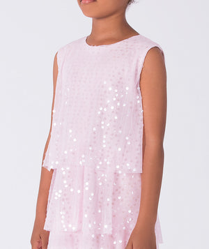 Pink sleeveless top with sequin details on a plain background