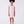 Load image into Gallery viewer, 5 years old girl wearing a light pink dress with white polka dots on a white background
