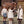 Load image into Gallery viewer, Pleated plaid girls 2-piece outfit with ivory ruffled blouse, blue plaid shorts and statement bow by Mama Luma.
