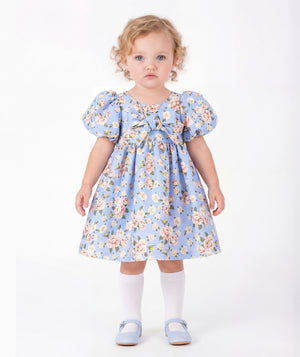 Porcelain Garden blue floral baby girl dress with pink roses, puff sleeves and layered bow details