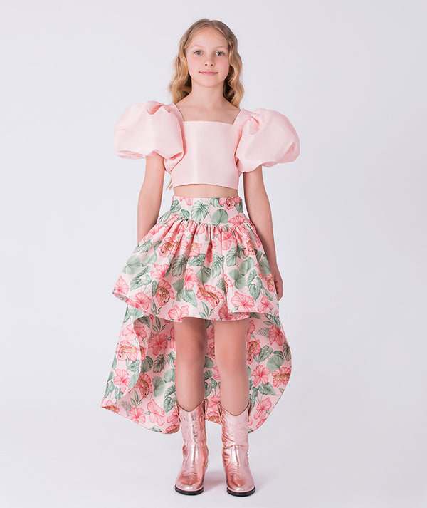 Close-up detail of the Puff Sleeve High-Low Skirt Outfit showing the structured puff-sleeve top crafted from premium lightweight fabric, cotton lined for comfort, designed for girls ages 3–12 for birthdays, Easter, and special occasions.