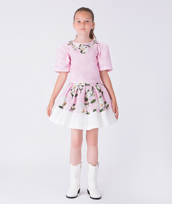 Elegant pink floral girls blouse with puff sleeves styled for weddings birthdays and special occasions