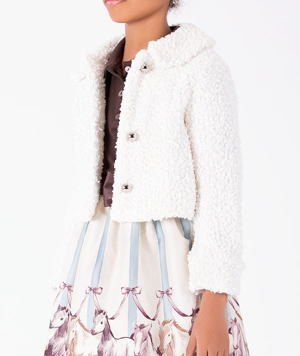 Detail view of Puffy Enchanting Buttons Girls Jacket in ivory with plush texture and jewel-inspired buttons for girls ages 3 to 12 by Mama Luma.