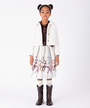Front view of Puffy Enchanting Buttons Girls Jacket in ivory with textured fabric and statement buttons for girls ages 3 to 12 by Mama Luma.