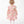 Load image into Gallery viewer, Back view of Rose Bloom Baby Dress in blush pink satin for babies 12 to 36 months, highlighting neckline, sleeves and embellishments

