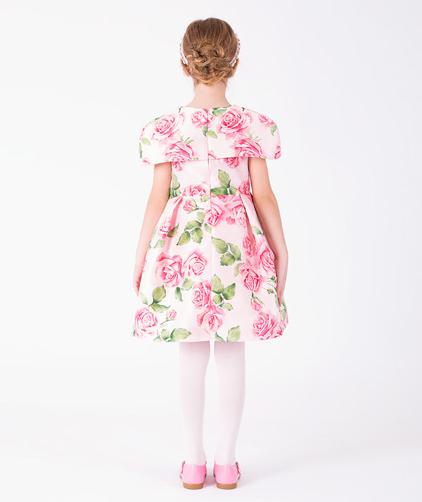 Back view of Rose Bloom Girls Dress in soft pink satin for girls ages 3 to 12, highlighting overall silhouette and styling