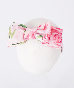 Front view of Rose Print Headband in blush pink, showing overall silhouette and styling