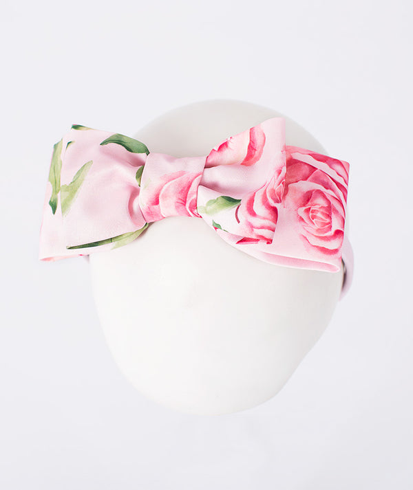 Front view of Rose Print Headband in blush pink, showing overall silhouette and styling