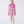Load image into Gallery viewer, Sheer puff sleeve girls outfit worn by a 6-year-old girl, featuring a statement bow top and tiered floral skirt for special occasions.
